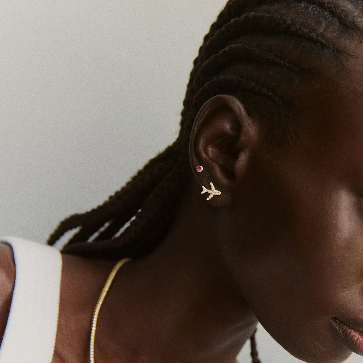 Lavisa - Airplane Pavé Crystal Gold Stud Earrings - Detail & Styling View
