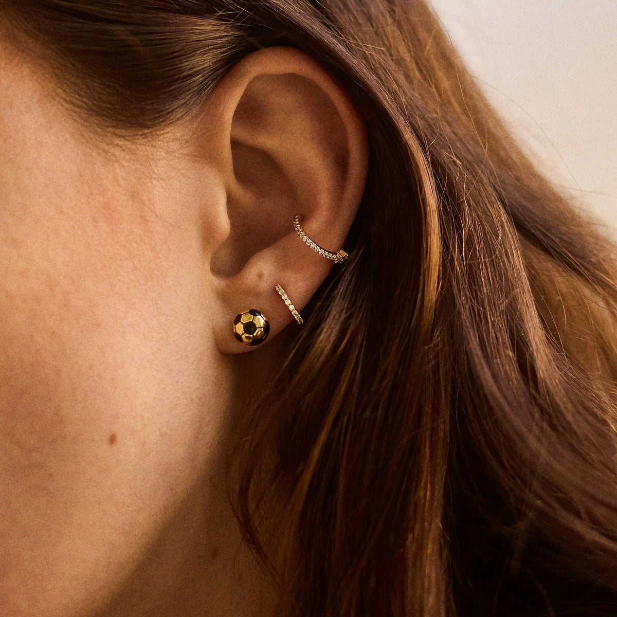Lavisa - Sports Theme Delicate Stud Earrings - Detail & Styling View