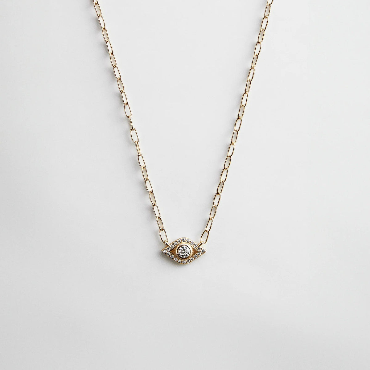 Lavisa - 14K Gold Evil Eye Charm Necklace - On-Model & Scale View