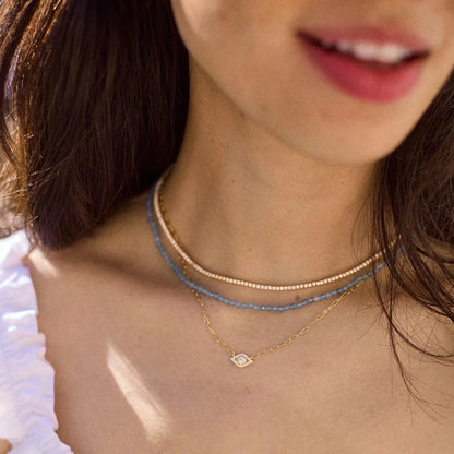 Lavisa - 14K Gold Evil Eye Charm Necklace - Detail & Styling View