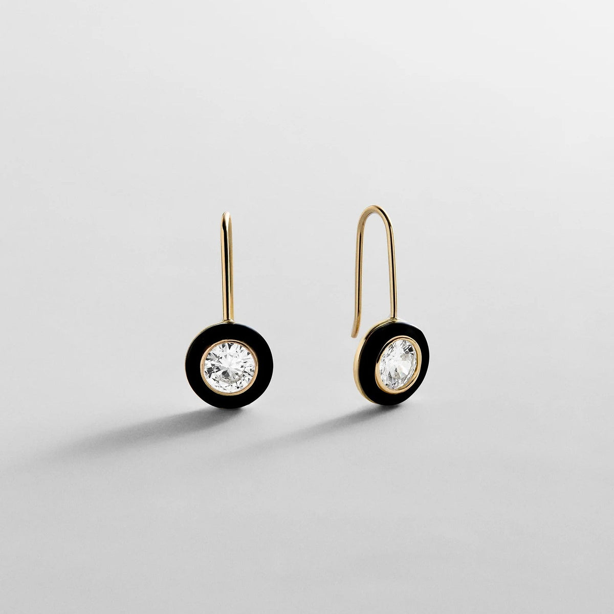 Lavisa 14K gold semi-precious onyx drop huggie earrings.