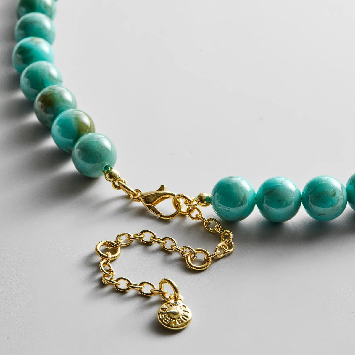Lavisa - Beaded Ring Necklace With Interchangeable Charm Holder - Texture & Setting View