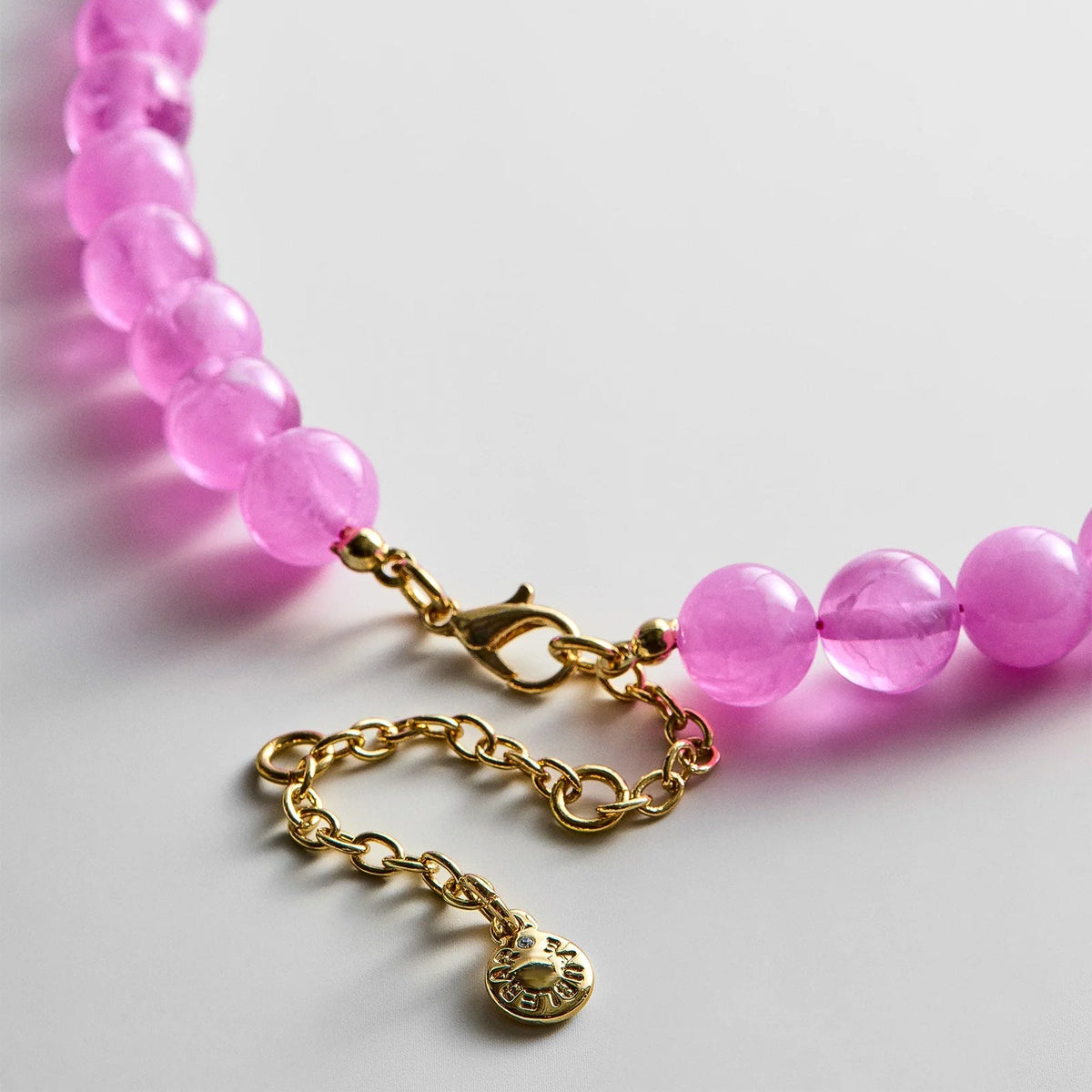 Lavisa - Beaded Ring Necklace With Customizable Charm Holder - Side Profile View
