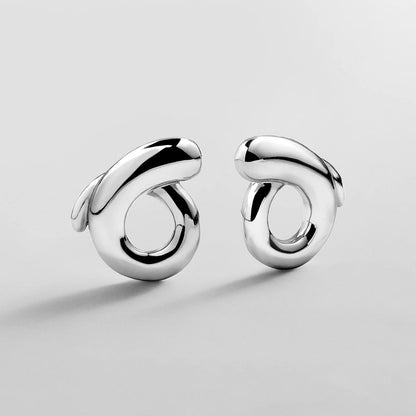 Lavisa sculptural twist silver stud earrings with glossy finish