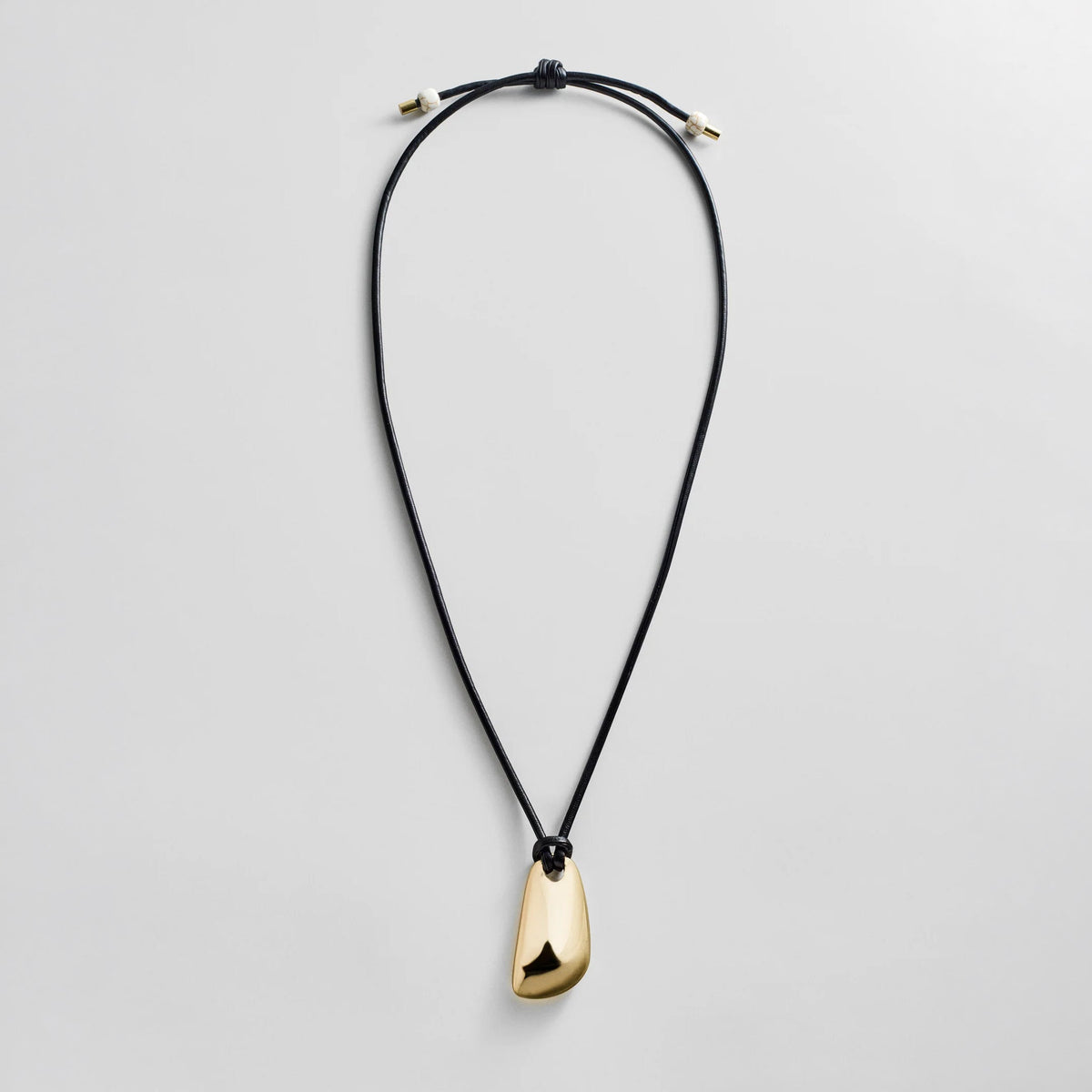 Lavisa - Sculptural Gold Pendant Cord Necklace - On-Model & Scale View