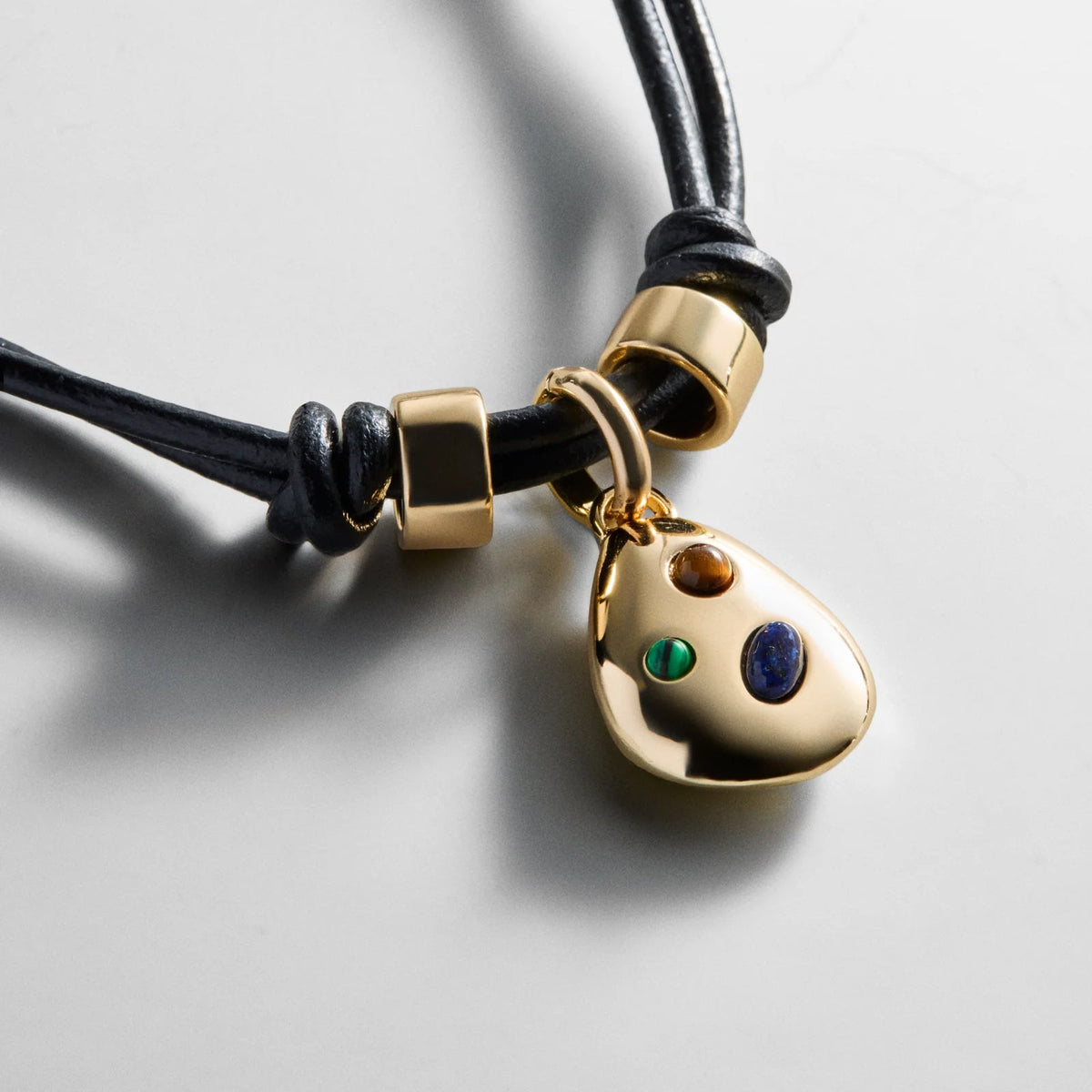 Lavisa gold teardrop pendant cord necklace with organic stones and gold beads