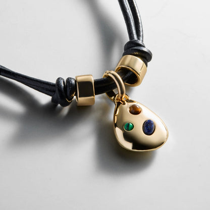 Lavisa gold teardrop pendant cord necklace with organic stones and gold beads