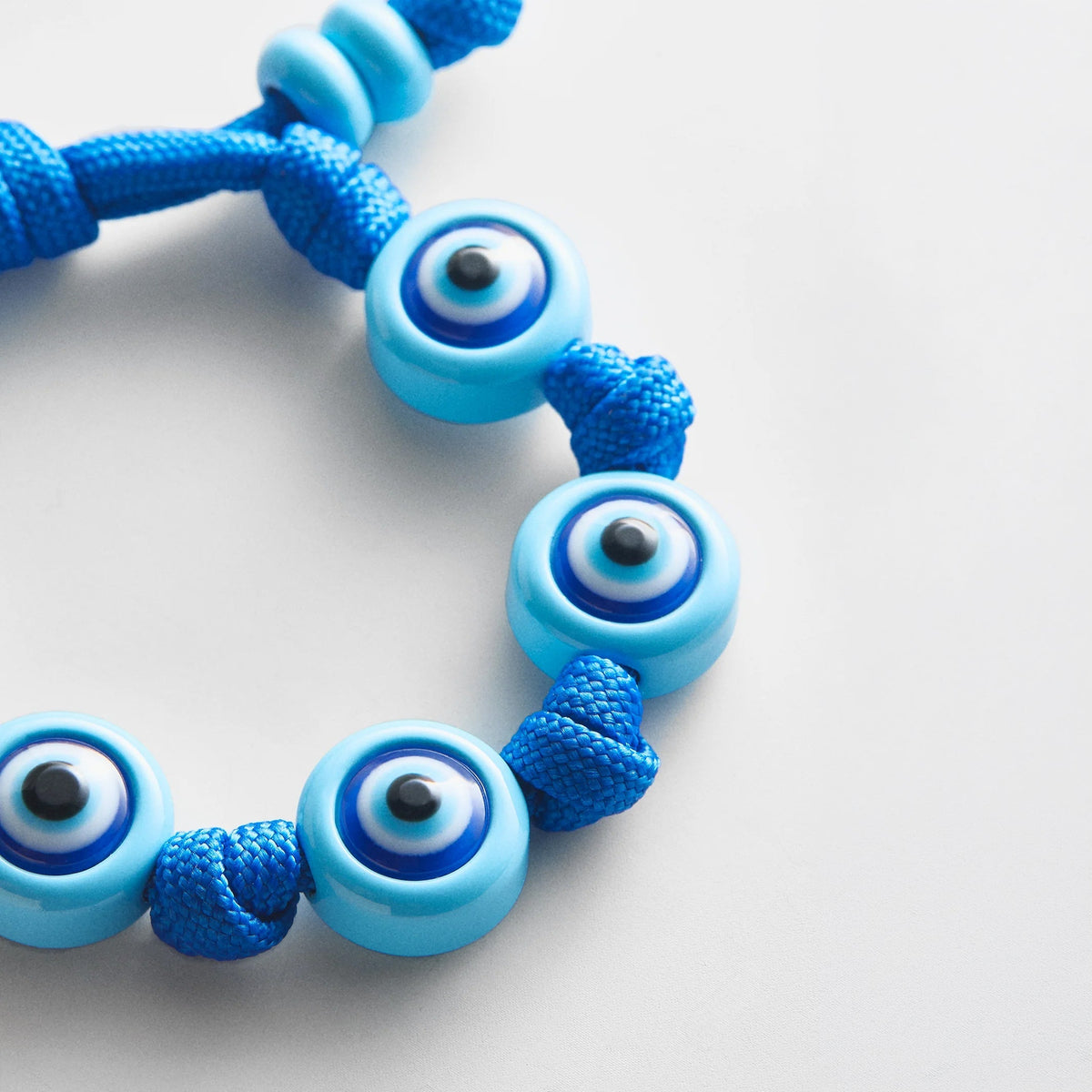 Lavisa - Knotted Cord Evil Eye Bracelet - On-Model & Scale View