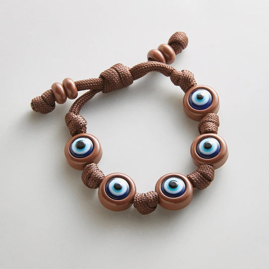 Lavisa chocolate brown knotty cord bracelet featuring vibrant evil eye beads