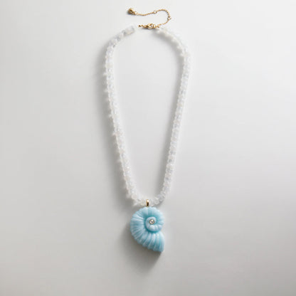 Lavisa Semi-Precious Shell Pendant Necklace featuring a blue spiral shell and white quartz beads