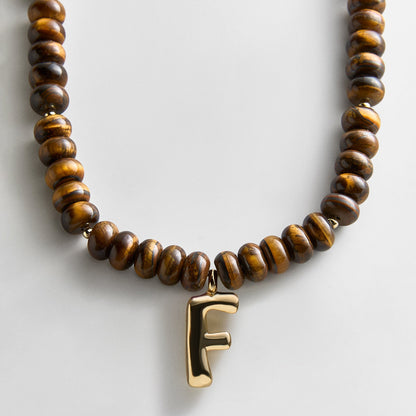Lavisa - Initial Bubble Letter Necklace - Tiger's Eye Gemstone Jewelry - Texture & Setting View