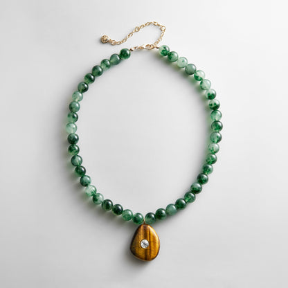 Lavisa semi-precious jade and tiger's eye necklace with crystal pendant.