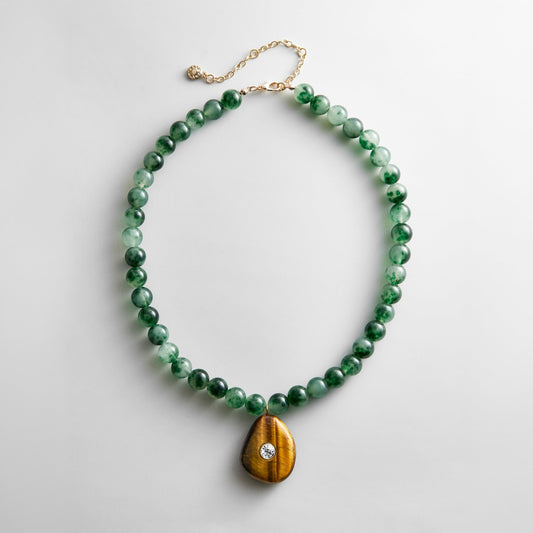 Lavisa semi-precious jade and tiger's eye necklace with crystal pendant.