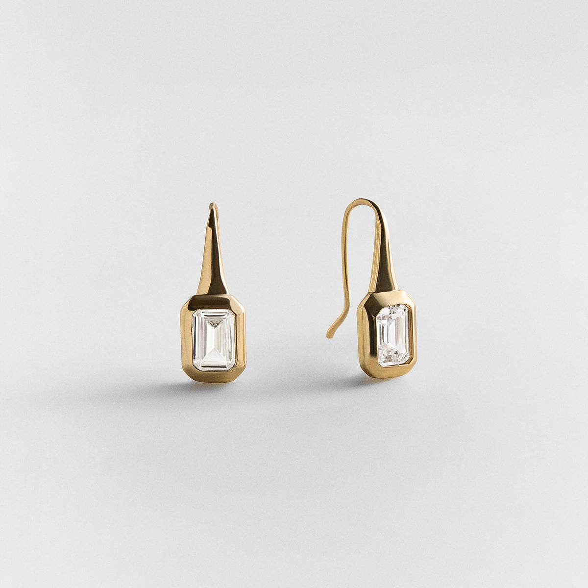 Lavisa gold emerald cut crystal drop earrings displayed cleanly