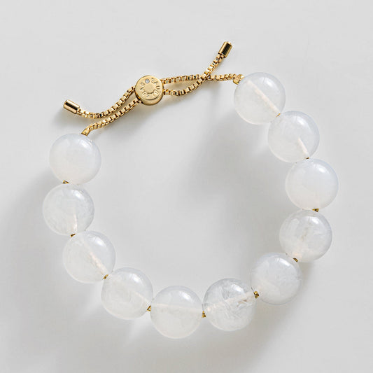 Lavisa ivory beaded bracelet on a delicate gold box chain with adjustable closure