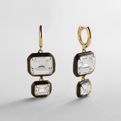 Lavisa crystal drop earrings featuring a bold black enamel bezel.