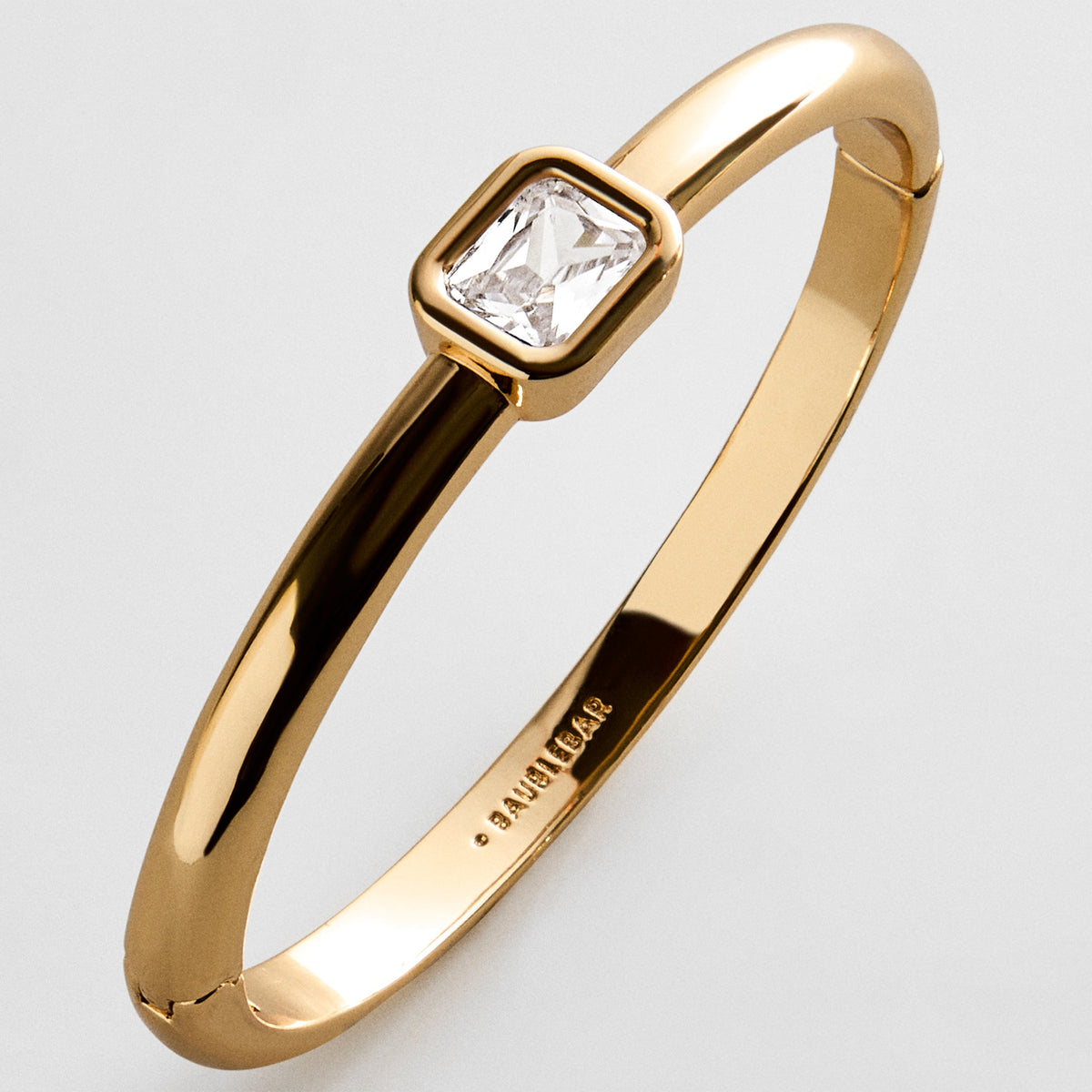 Lavisa gold hinge bangle bracelet with rectangle crystal bezel station
