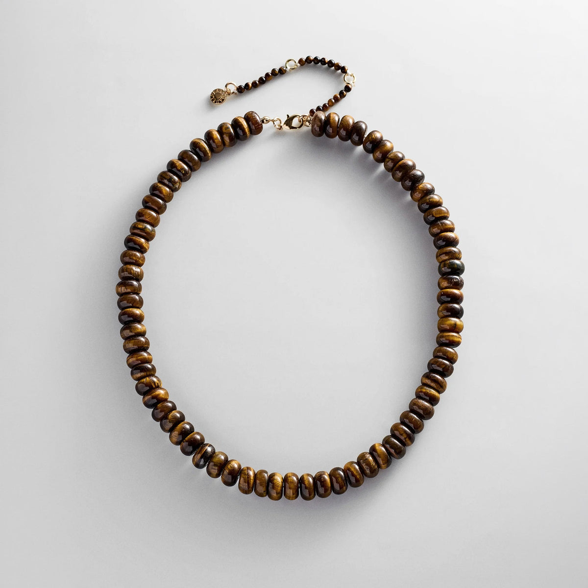 Lavisa tiger's eye semi-precious beaded necklace on display