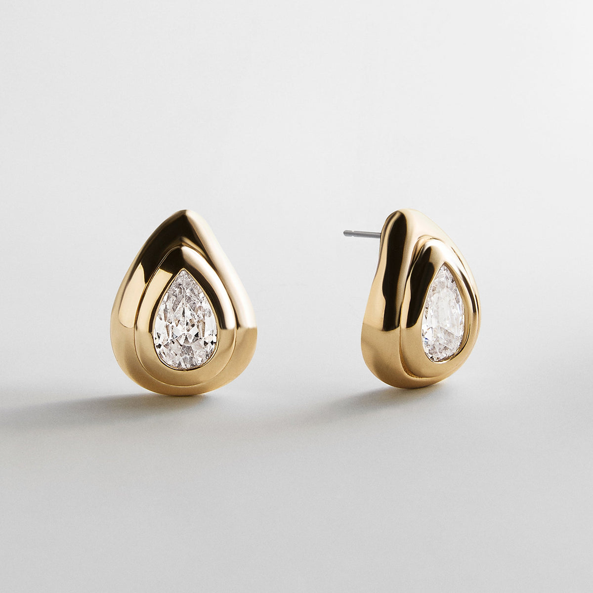 Lavisa Crystal Teardrop Gold Stud Earrings with etched details