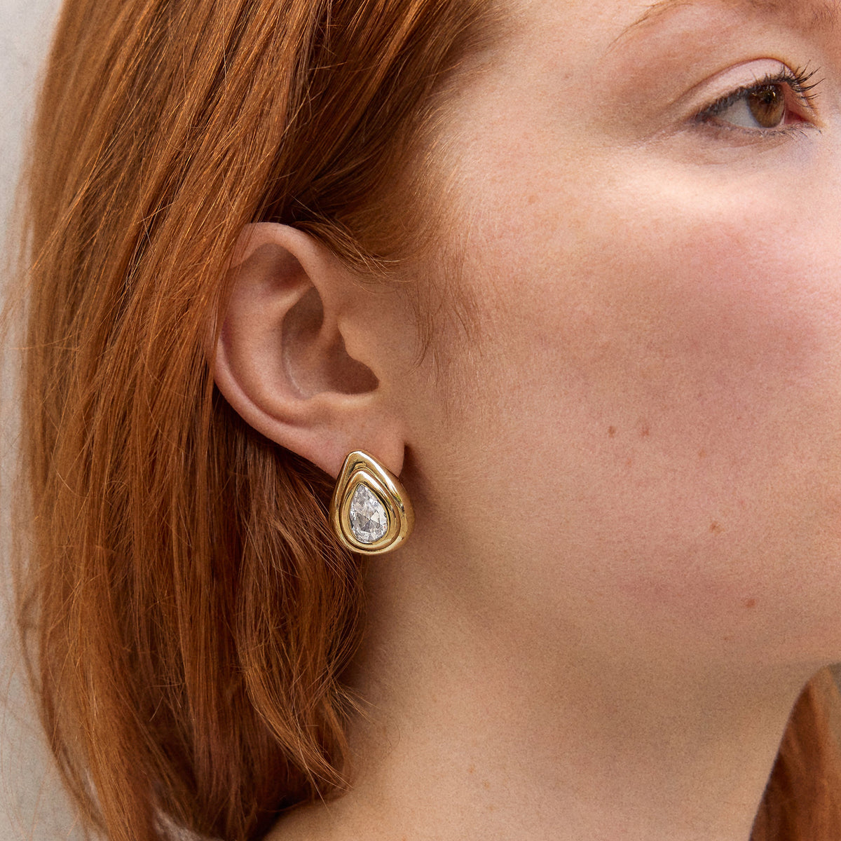 Lavisa - Crystal Teardrop Gold Stud Earrings - Detail & Styling View