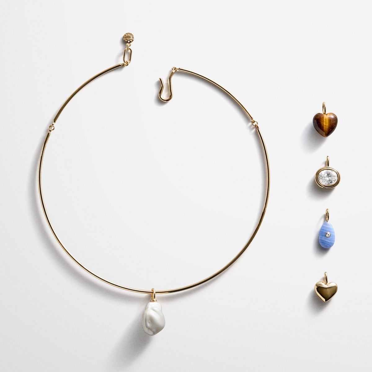 Lavisa Removable Charm Collar Necklace with interchangeable crystal and pearl charms in a storage case