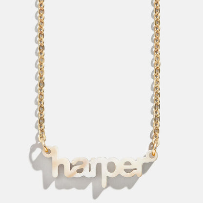 Lavisa Custom Acrylic Nameplate Necklace displayed in gold with custom lettering