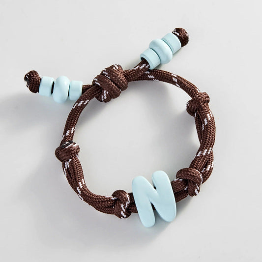 Lavisa Custom Enamel Initial Bracelet with colorful letters on paracord