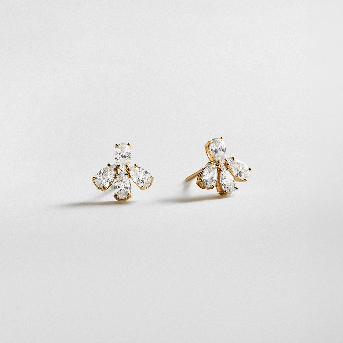 Lavisa 14K gold stud earrings with pear-cut cubic zirconia stones.