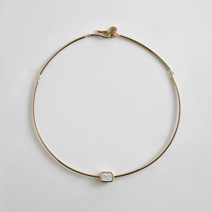 Lavisa Cubic Zirconia Collar Necklace featuring a rectangle-cut crystal and gold wire structure