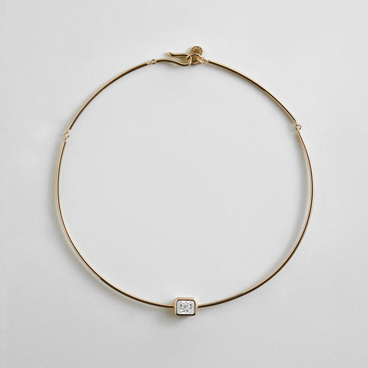 Lavisa Cubic Zirconia Collar Necklace featuring a rectangle-cut crystal and gold wire structure