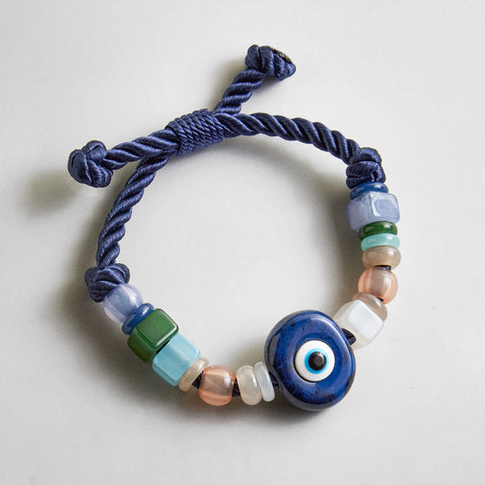 Lavisa navy evil eye statement beaded bracelet with blue resin beads