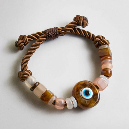 Lavisa evil eye beaded statement bracelet in brown tones