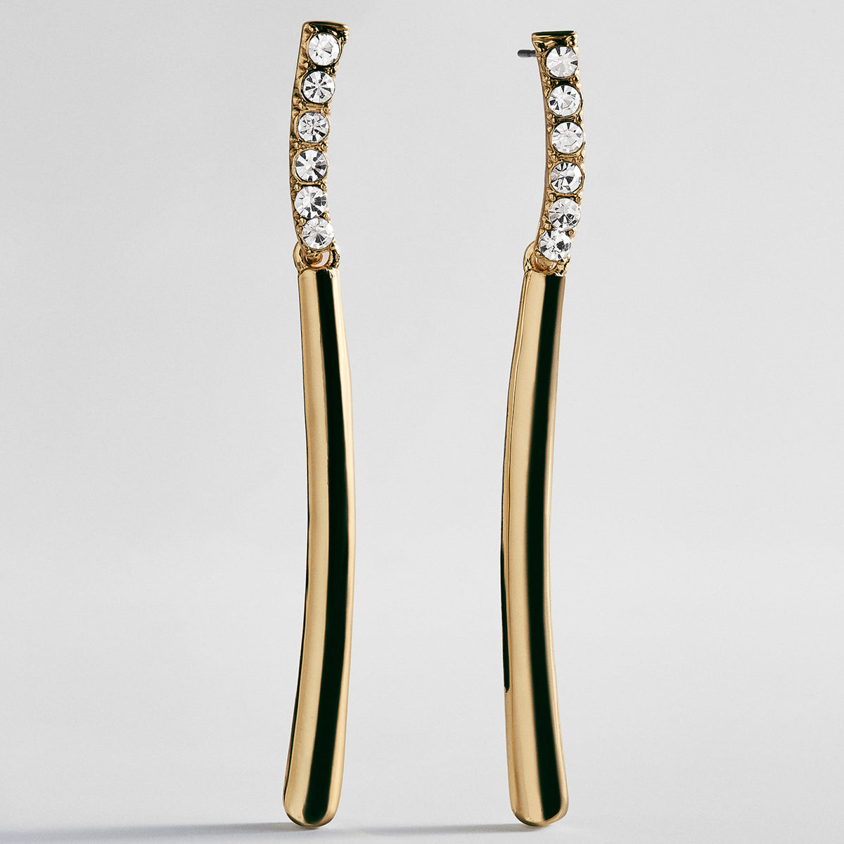 Lavisa gold bar drop earrings with pavé crystal detailing on top and glossy gold bottom