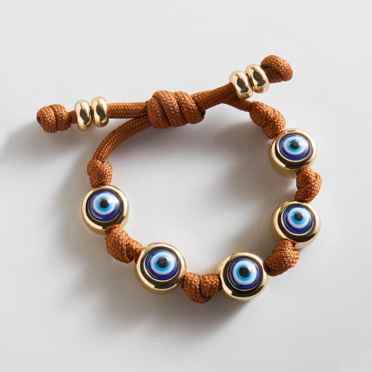 Lavisa evil eye paracord braided bracelet in golden brown color