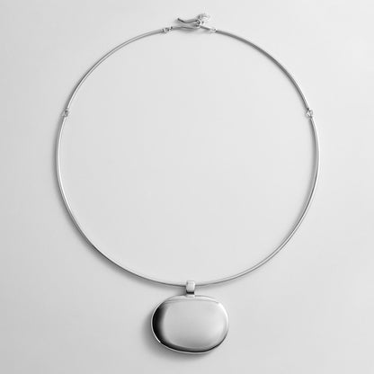 Lavisa Silver Pendant Collar Necklace featuring a glossy silver statement pendant