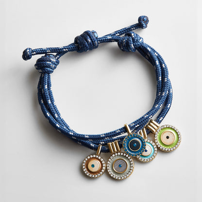 Lavisa Evil Eye Layered Charm Bracelet featuring multicolored evil eye charms on blue paracord