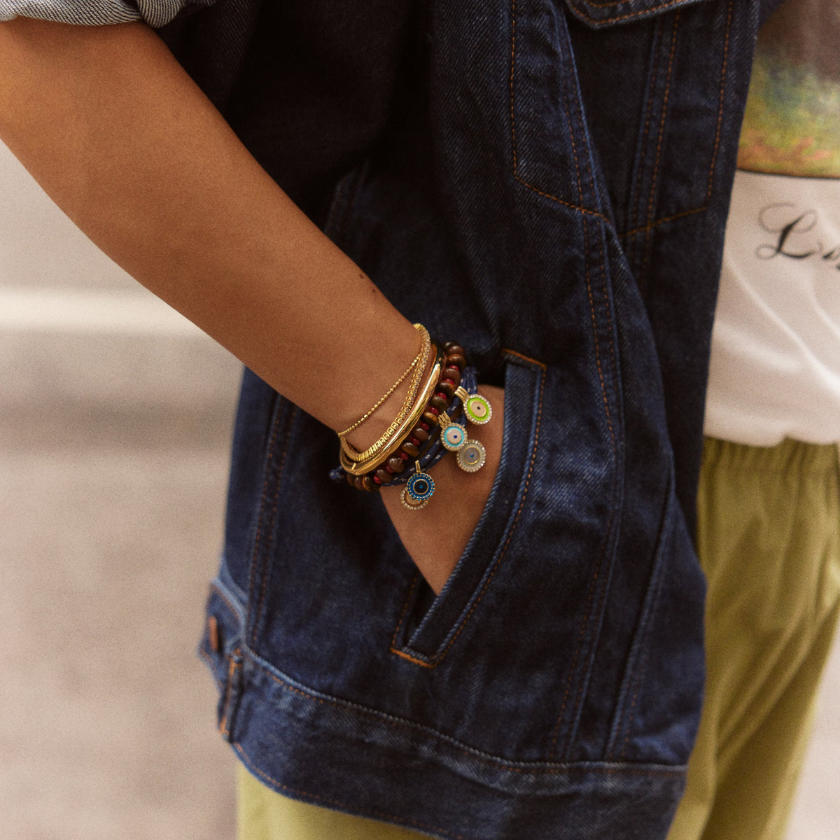 Lavisa - Evil Eye Layered Charm Bracelet - Adjustable Paracord Jewelry - Detail & Styling View