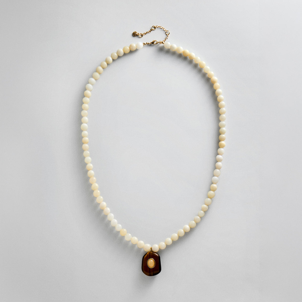 Lavisa Ivory Beaded Pendant Layering Necklace with tiger eye stone