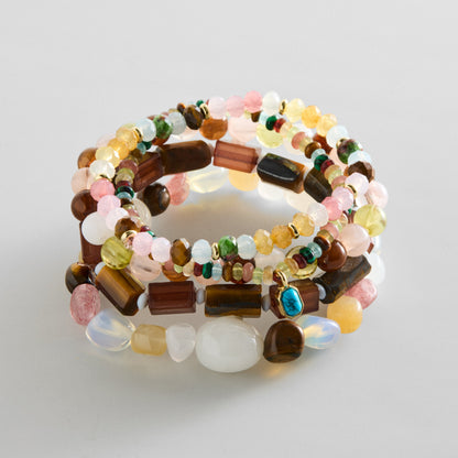 Lavisa Semi-Precious Beaded Bracelet Stack featuring five neutral gemstone and glass bead bracelets.
