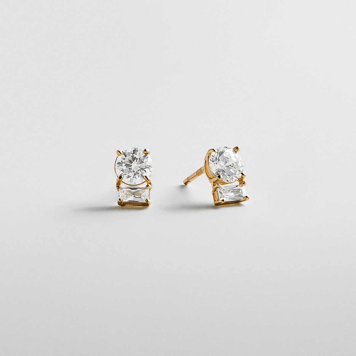 Lavisa cubic zirconia baguette and round crystal stud earrings in 14k gold plating