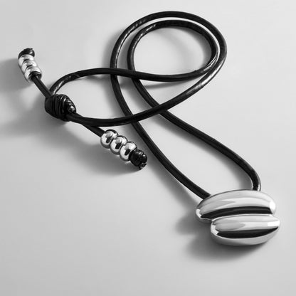 Lavisa Asymmetrical Pendant Necklace on an adjustable black cord
