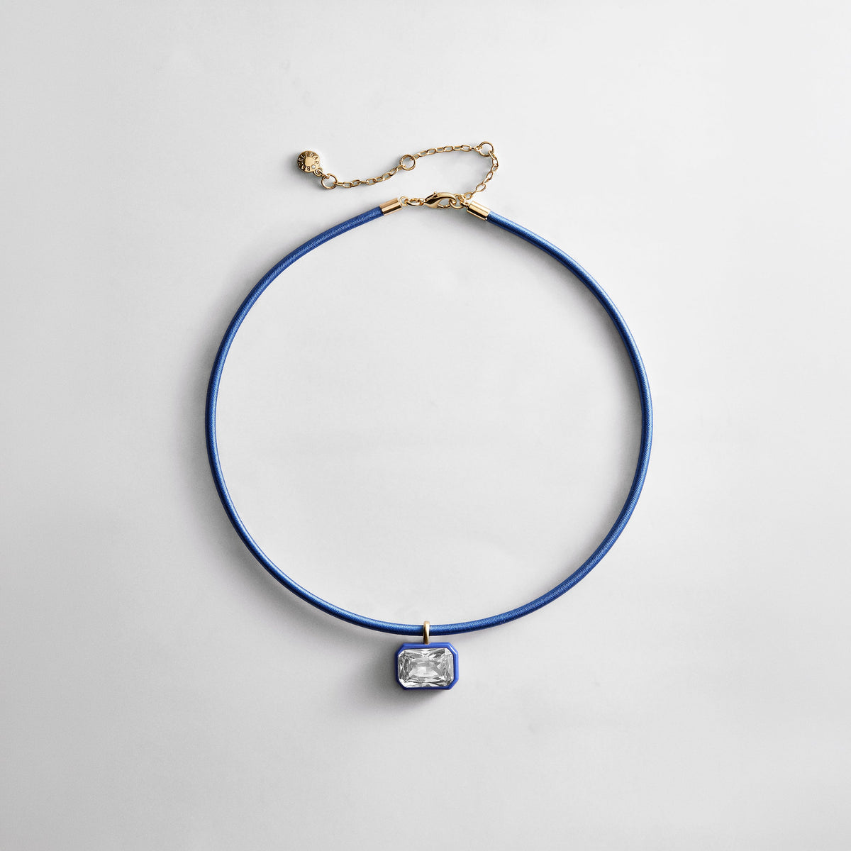 Lavisa Crystal Collar Necklace in Lapis featuring a vibrant gemstone and comfortable thread-wrapped design