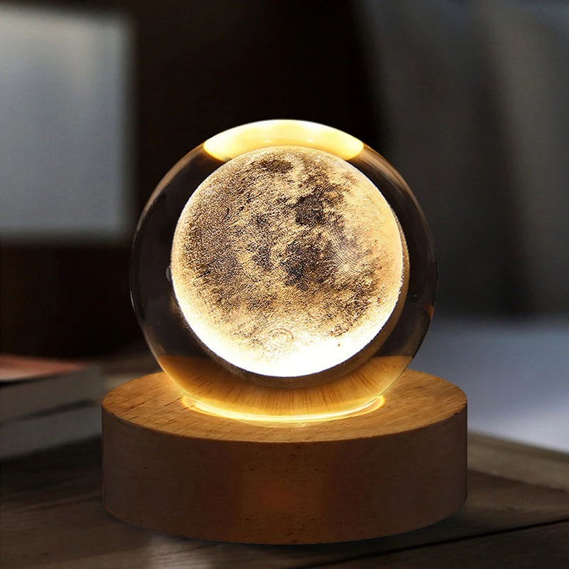 Lavisa 3D Crystal Ball Lamp glowing on a wooden base with a celestial galaxy design (View 4)