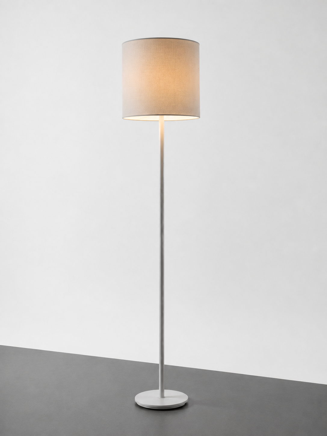 Lavisa minimalist white floor lamp with fabric drum shade and metal base