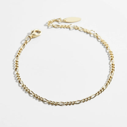 Lavisa Classic Figaro Gold Chain Bracelet featuring high-polish 18K gold links.