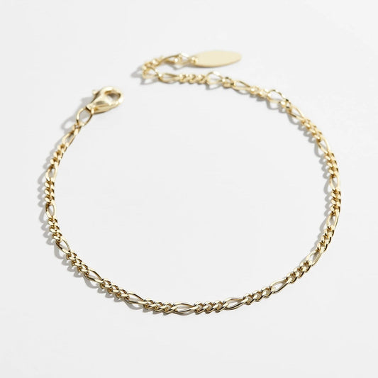 Lavisa Classic Figaro Gold Chain Bracelet featuring high-polish 18K gold links.