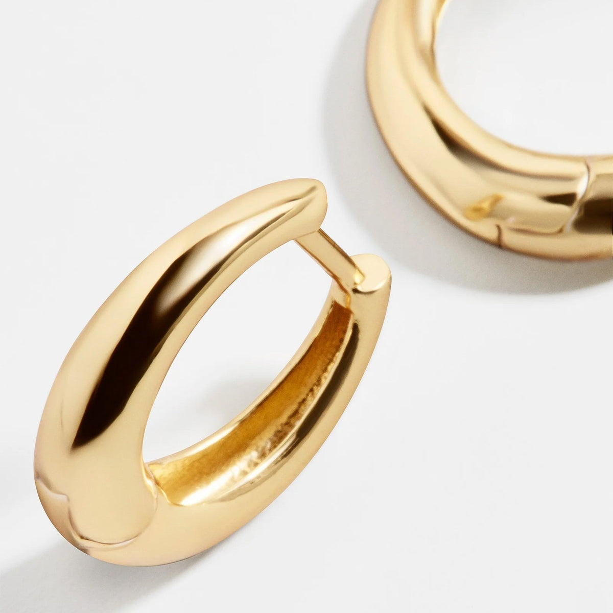 Lavisa - 14K Gold Classic Thick Huggie Hoops Earrings - On-Model & Scale View