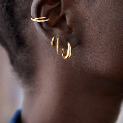 Lavisa - 14K Gold Classic Thick Huggie Hoops Earrings - Detail & Styling View