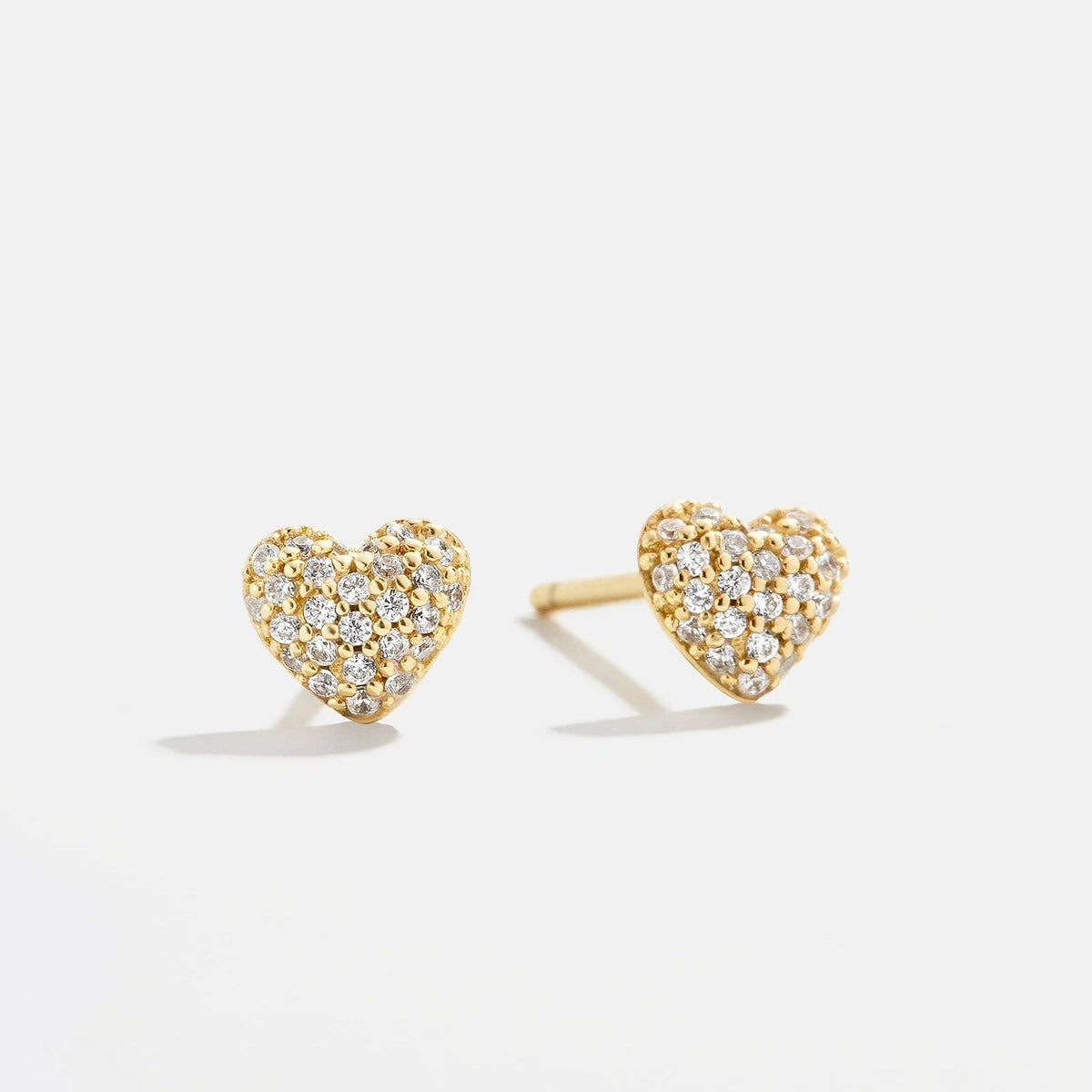 Lavisa modern pavé heart gold earrings displayed against a neutral background