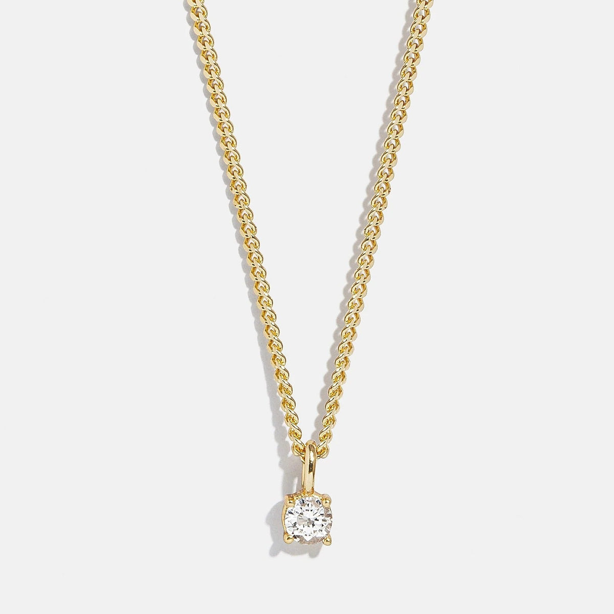 Lavisa 18K Gold Curb Chain Necklace featuring a sparkling cubic zirconia pendant on a delicate chain